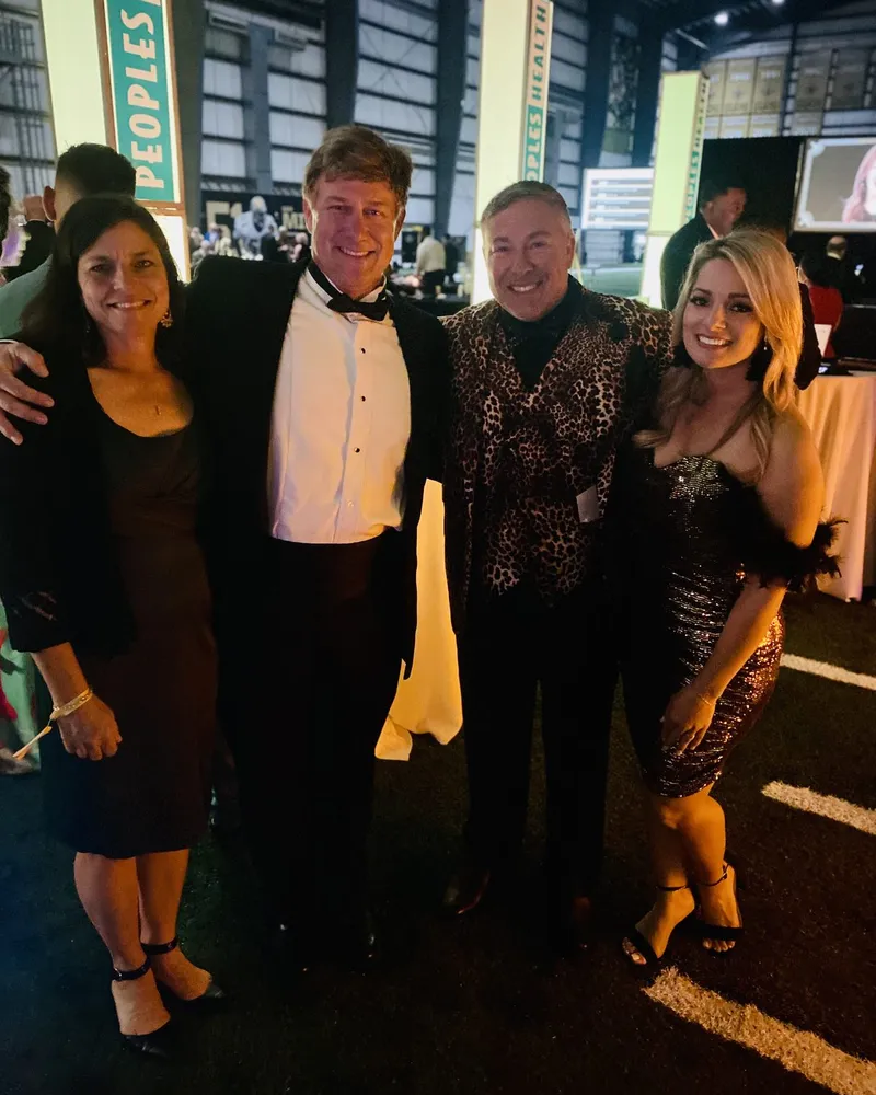 Tim Baudier with friends at a formal Jefferson Parish gala